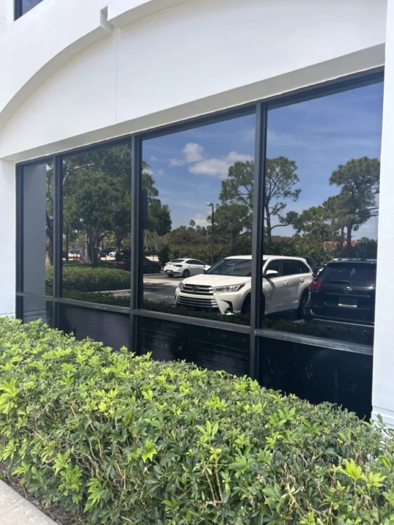 Office building windows with reflective commercial window tint