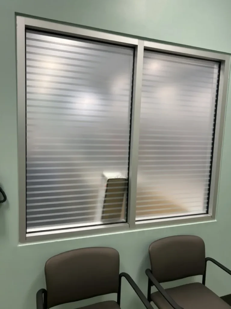 Decorative privacy window film on office interior windows