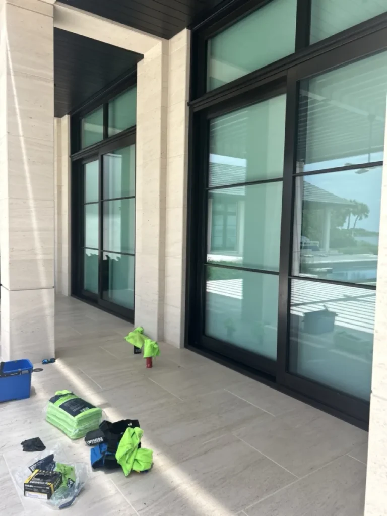 Tinted patio doors and windows on a luxury home